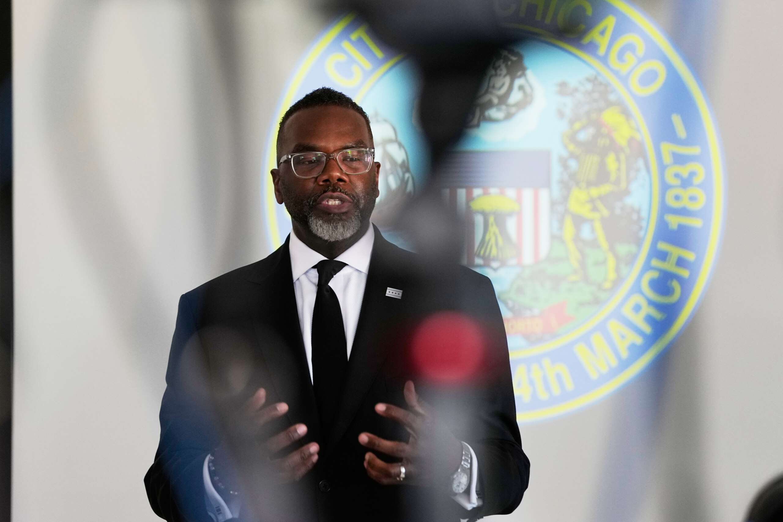 How will Chicago address a projected $882 million budget deficit?